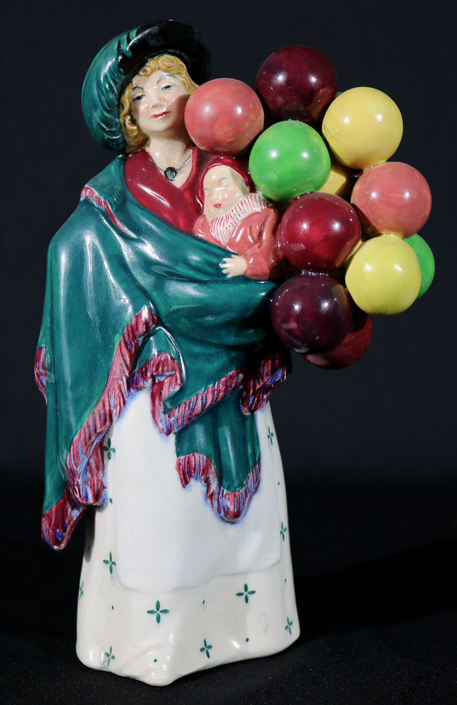 003a - Royal Dalton figurine, Balloon Seller, 9 in. T, 6 in. W.