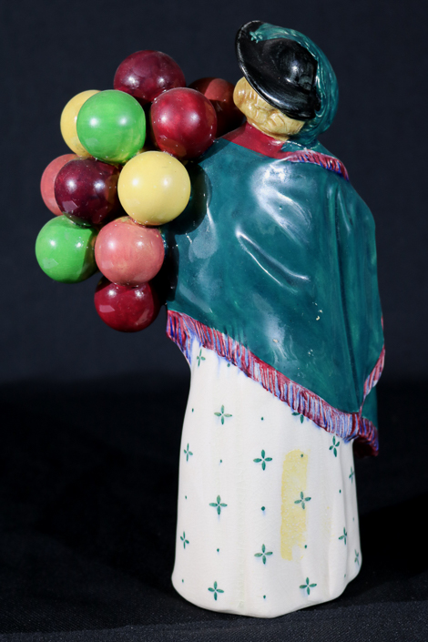 003c - Royal Dalton figurine, Balloon Seller, 9 in. T, 6 in. W.