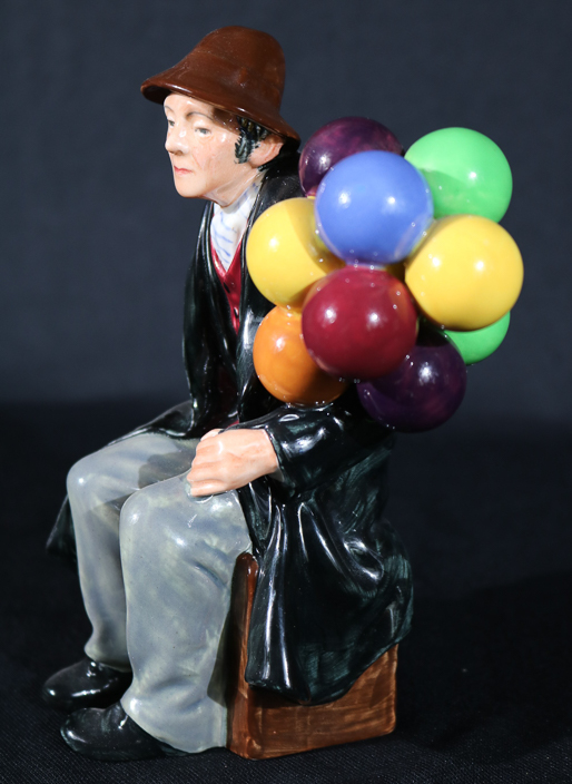 004d - Royal Dalton figurine, Balloon Man, 7 in. T, 5 in. W, 4 in. D.