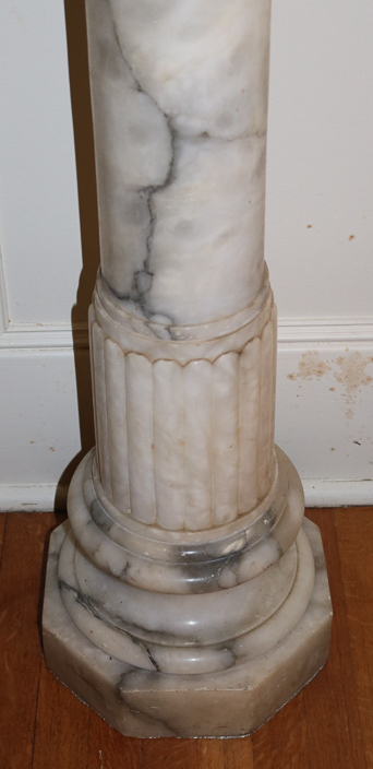 023b - Heavy antique marble pedestal with no damage, 44 in. T, 12 in. D.