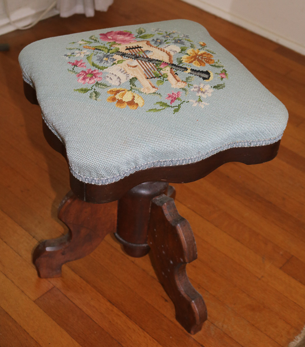 024a - Walnut Victorian piano stool with great needlepoint upholstery with stitched musical instrument, 20 in. T, 15 in. Sq.