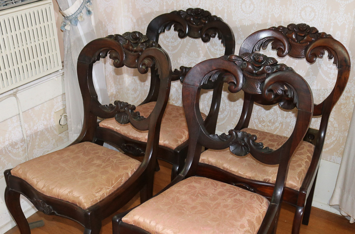 025c - Set of walnut Victorian dining chairs with carved back, 32.5 in. T, 17  in. W, 14 in. D.