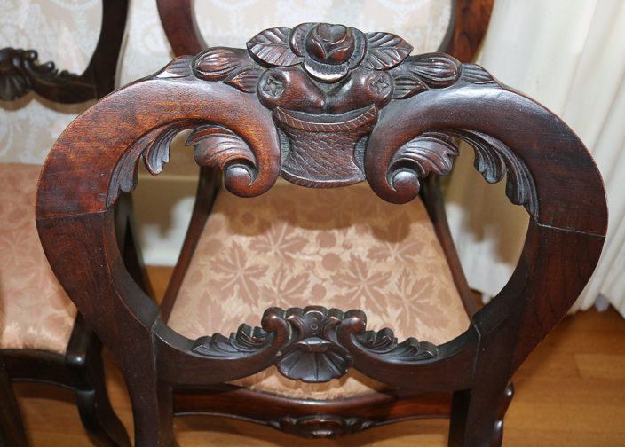 025d - Set of walnut Victorian dining chairs with carved back, 32.5 in. T, 17  in. W, 14 in. D.