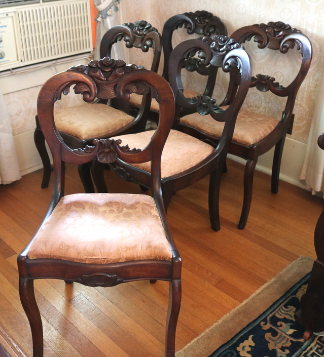 025e - Set of walnut Victorian dining chairs with carved back, 32.5 in. T, 17  in. W, 14 in. D.