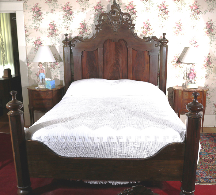 071a - Mahogany Empire high back bed with ornate crown by Mitchell and Rammelsberg , 87 in. T, 74  in. L, 61 in. W.