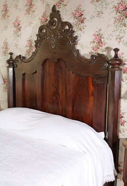 071c - Mahogany Empire high back bed with ornate crown by Mitchell and Rammelsberg , 87 in. T, 74  in. L, 61 in. W.