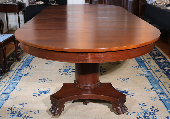 073a - Mahogany Empire banquet table with 5 leaves and claw feet, 54 in. W, 10.1 in. L, 31 in. T.