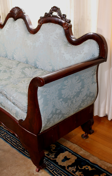 075b - Mahogany Empire triple back sofa with blue upholstery, goosedown cushions, 40 in. T, 83 in. L, 20 in. D.