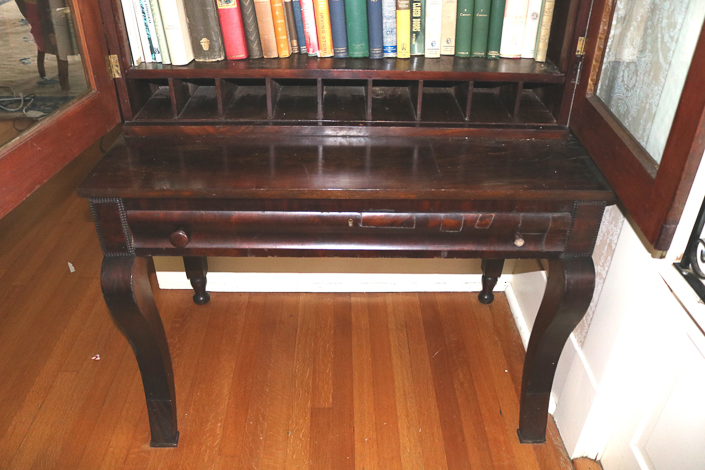 077d - Antique mahogany plantation desk with 2 doors, 1 drawer and wood pulls, from family plantation in LA, 87  in. T, 22 in. W, 25 in. D.