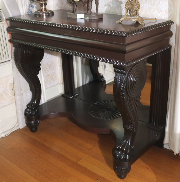 085a - Mahogany Empire pier table with claw foot support and gadrooned edge, 37.5 in. T, 41.5 in. W, 20 in. D.