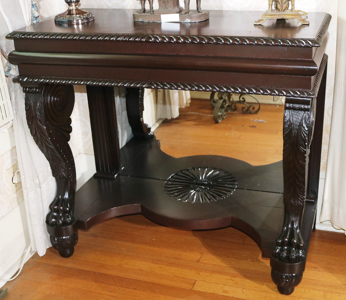 085b - Mahogany Empire pier table with claw foot support and gadrooned edge, 37.5 in. T, 41.5 in. W, 20 in. D.