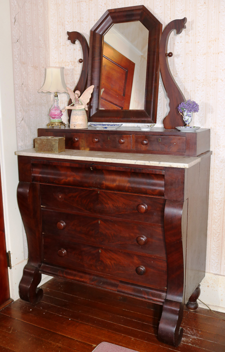 091a - Mahogany Empire dresser with marble insert, glove box and scroll feet, from family sugar plantation in LA, 75.5 in. T, 20 in. D.