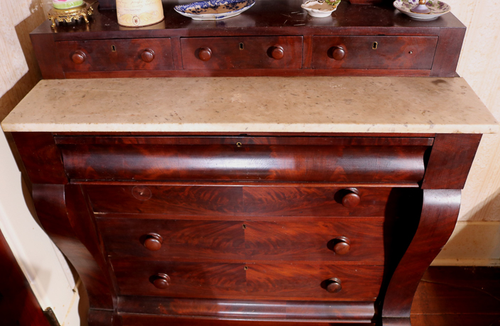091c - Mahogany Empire dresser with marble insert, glove box and scroll feet, from family sugar plantation in LA, 75.5 in. T, 20 in. D.