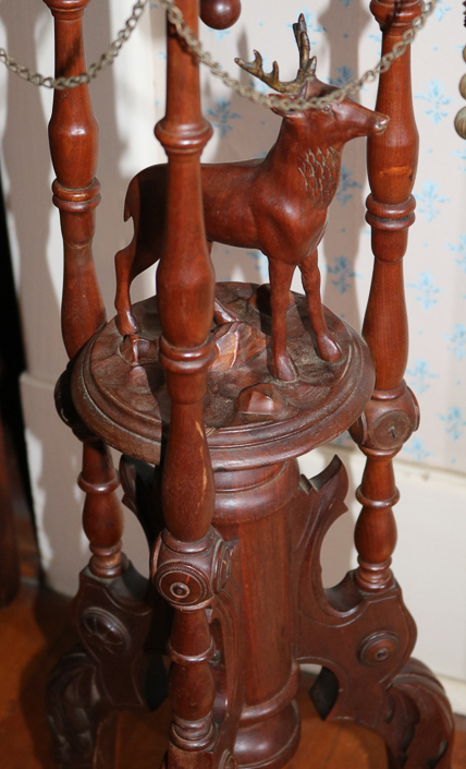 093b - Walnut Victorian fern stand with brown insert marble and deer, 36.5 in. T, 11.5 in. Dia.