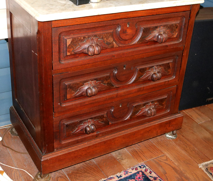 095b - Walnut Victorian bachelors chest with carved  wood pulls, 29 in. T, 30 in. W, 18 in. D.