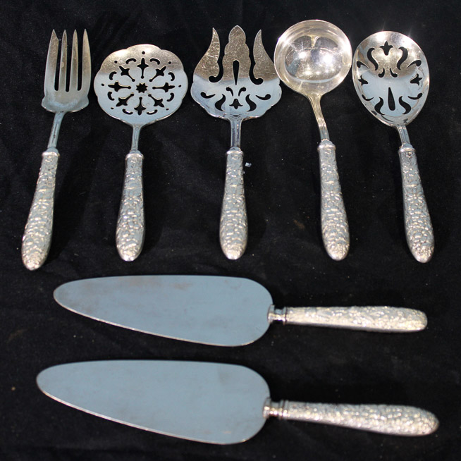 259a - 7 piece repousse sterling silver serving pieces