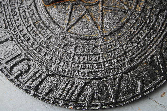 480c - Black cast iron sun dial, 16 in. R.