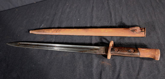 357a - Old military bayonet with shield, 20 in L.